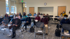 Group shot of the audience at the HSOC undergraduate research symposium including students and professors