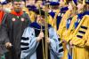 Susan Cozzens carries the mace at Commencement