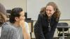 A Georgia Tech student speaks with a professor during class.