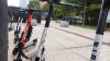 A row of Bird and Jump e-scooters parked on a sidewalk. (Photo: Joshua Stewart)
