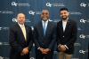 Archie Ervin, Eddie Glaude Jr, and Rohan Sohani pose in front of a backgroup that reads Georgia Tech Institute Diversity, Equity, and Inclusion